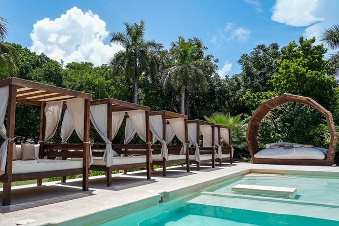 Isla Mujeres Catamaran, Open Bar and Beach Club Tour - Club Playa Mexico and the two-hour beach break