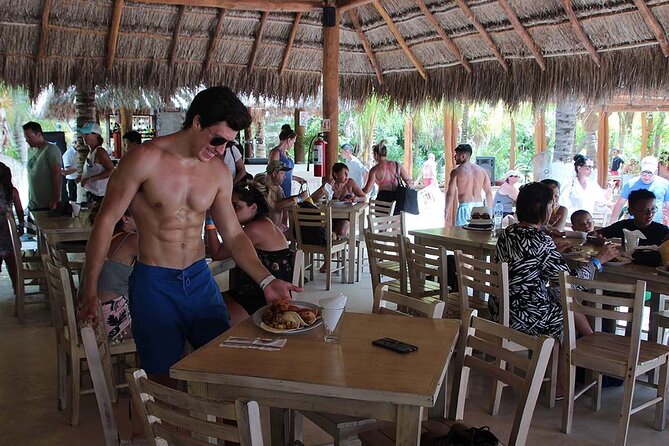 Isla Mujeres Catamaran! Party & Premier Beach Club (Adults Only) - Lunch and the Isla Mujeres beach club