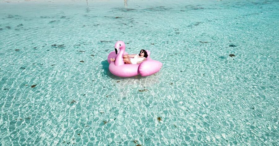 Isla Mujeres: Catamaran Ride with Open Bar, Snorkeling, and Lunch - The return sail and the social atmosphere