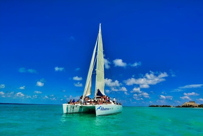 Isla Mujeres Catamaran Sailing Experience with Lunch & Open Bar - Drinks, music, and the ride home