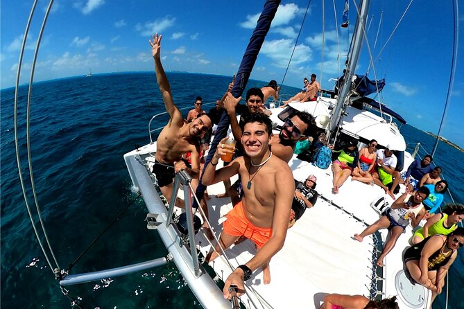 Isla Mujeres Catamaran + Snorkel + Open Bar on board + Buffet - Sailing from Cancun with music, drinks, and a busy deck