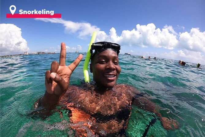Isla Mujeres Catamaran + Snorkel + Open Bar on board + Buffet - Isla Mujeres: lunch, beach-club time, and a short island visit