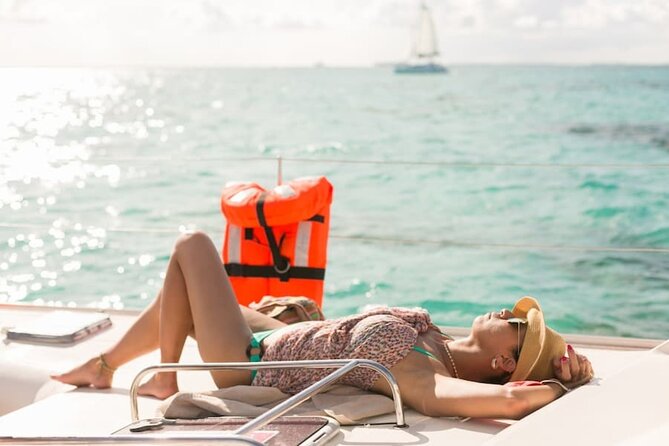 Isla Mujeres Catamaran Tour with Snorkel, Open bar and Transport - Playa Tortugas starts the morning early