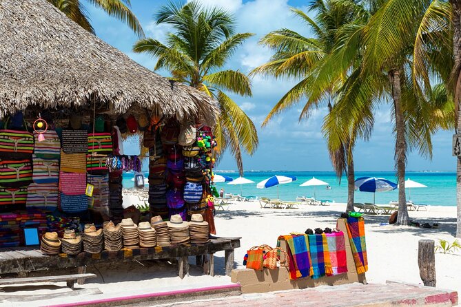 Isla Mujeres Catamaran Tour with Snorkel, Open bar and Transport - Isla Mujeres offers a quick taste of island life