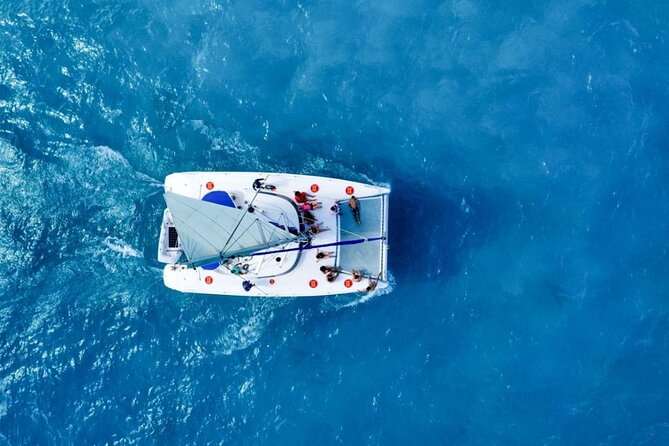Isla Mujeres: Catamaran Tour with Snorkeling Food, Drinks, Beach - Isla Mujeres center, shops, and short island time