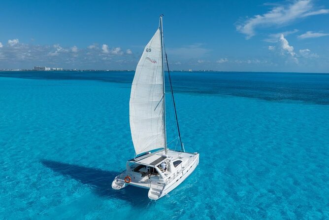 Isla Mujeres Day Tour with Catamaran, Snorkeling & Beach Club - Snorkeling at the Bahia Mujeres reef