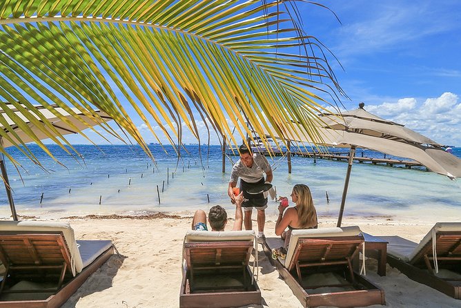 Isla Mujeres luxury catamaran with premium open bar and lunch - Snorkeling in clear Caribbean water