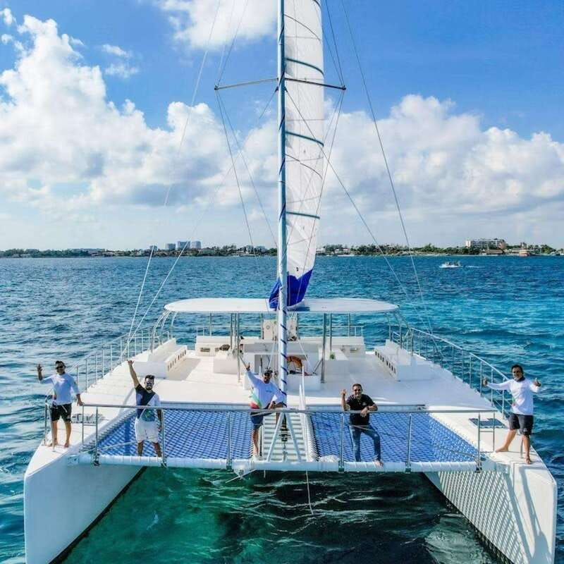 Isla Mujeres Plus Experience Catamaran Tour + Snorkel+Lunch - Isla Mujeres free time: beach, town, and crowds