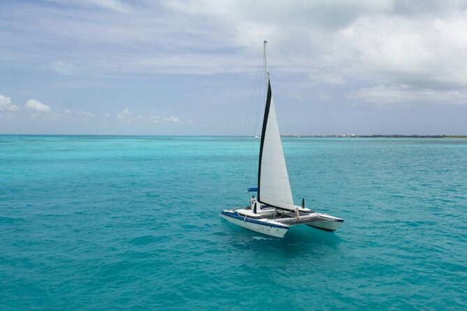 Isla Mujeres Premium Tour in Catamaran with Snorkel and Buffet - Sailing to El Meco reef
