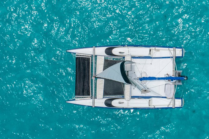 Isla Mujeres Premium Tour in Private Catamaran with Lunch - The return sail, music, sunset, and spinnaker flight