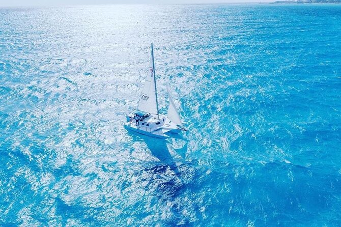 Isla Mujeres Tour in Private Catamaran with Snorkel and Lunch - The return sail, sunset, and spinnaker option