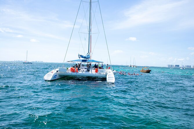 Isla Mujeres Tour on Catamaran with Snorkel, Open Bar, Buffet & Beach club - Snorkeling at El Meco Reef