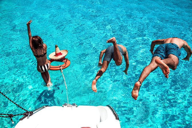 Isla Mujeres Tour on Catamaran with Snorkel, Open Bar, Buffet & Beach club - Isla Mujeres free time without a guide