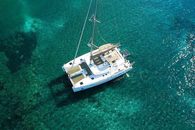Island Hopping: Santorini Catamaran Charter Cruise with a skipper - Day One: Board the Lagoon Catamaran