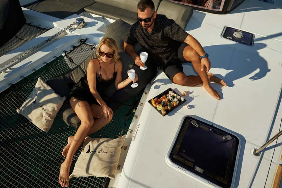 Kissamos: Catamaran Balos Sunset Cruise with Sushi & Drinks - Sailing toward Balos and the Agios Sozon stop