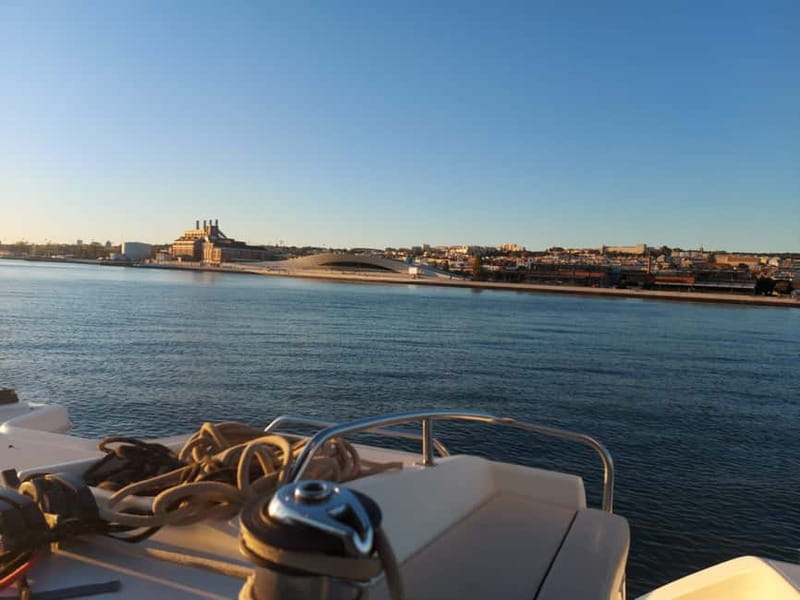 Lisbon: Catamaran Cruise with Drinks & Pastel de Nata - Commerce Square and the first look back at Lisbon
