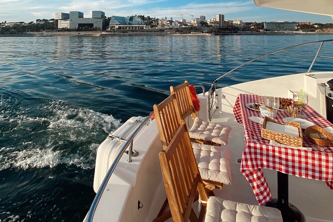Lisbon: Catamaran Luxury Sunset and Wine Tour - Praça do Comércio from the water