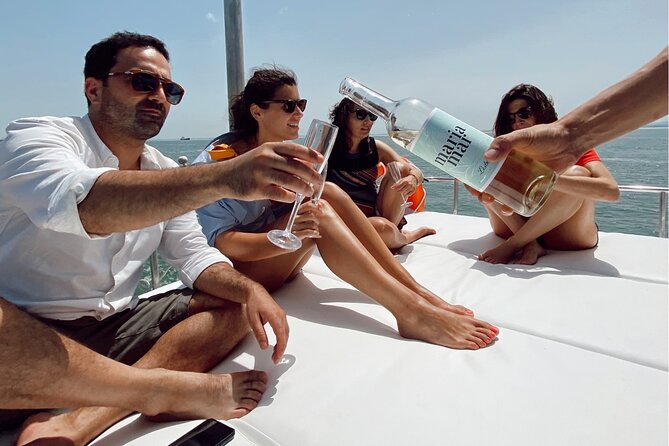 Lisbon: Catamaran Luxury Sunset and Wine Tour - Starting at Doca de Belém