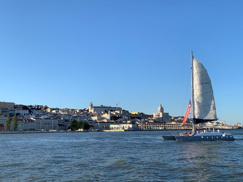 Lisbon: Private Catamaran Charter for up to 18-People - Toward Lisbon and the 25th of April Bridge