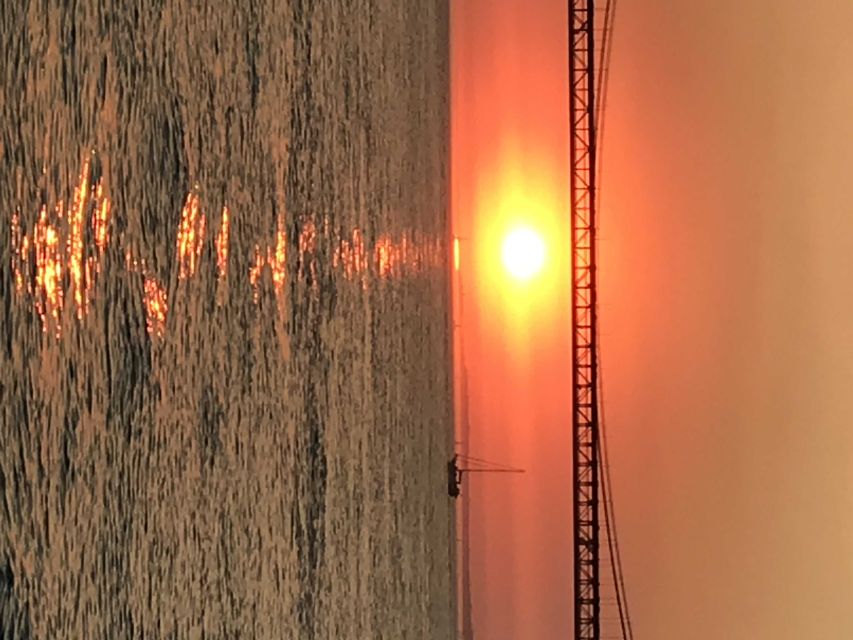 Lisbon: Sunset and Wine Luxury Catamaran Cruise - Leaving from Alcantara and finding the office