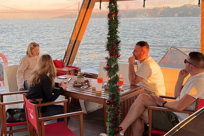 Lisbon : Sunset Catamaran Boat Tour with Music and Drinks - Drinks, music, and the real tone of the boat