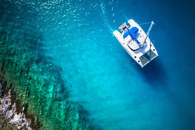 Live this unique experience. Catamaran to Isla Mujeres Tour. Open Bar included. - Key details to know before sailing