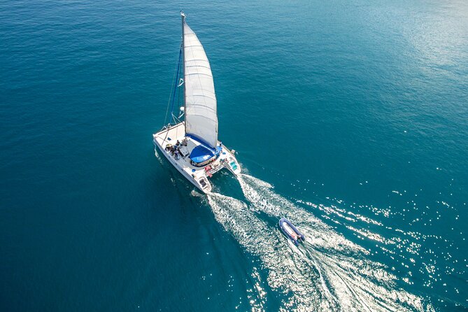 Live this unique experience. Catamaran to Isla Mujeres Tour. Open Bar included. - Timing, weather, and practical planning