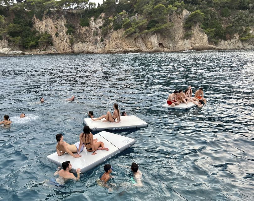 Lloret de Mar: Sunset Catamaran Cruise with DJ and Drinks - Five drinks and a party-ready atmosphere