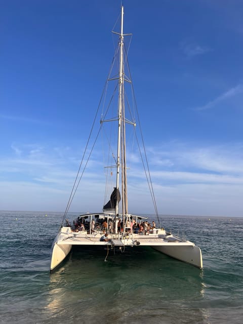 Lloret de Mar: Sunset Catamaran Cruise with DJ and Drinks - Seeing the Costa Brava from the water