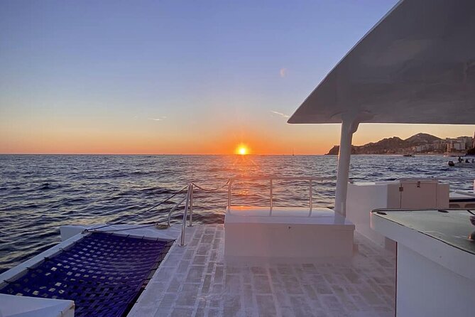 Los Cabos Catamaran: Iconic Sunset Cruise with Drinks & DJ - Open bar and a proper plate of Mexican-style food