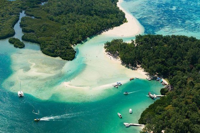 Luxury All-Inclusive Catamaran Cruise to Ile aux Cerfs and GRSE Waterfall - Snorkeling is included, while thrill rides may cost more