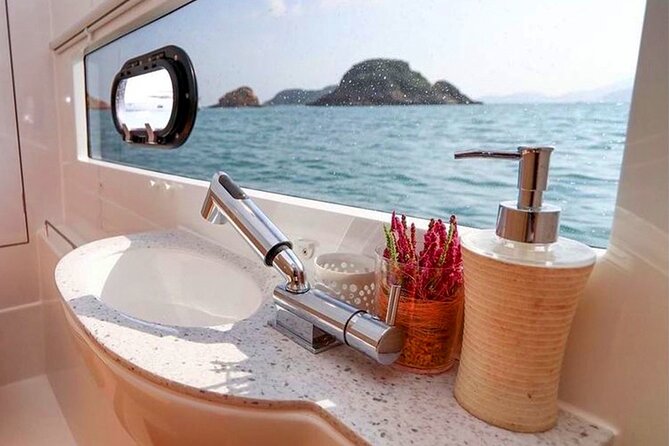 Luxury Catamaran Champagne Sunset Cruise - After sunset, Charlotte Amalie lights up