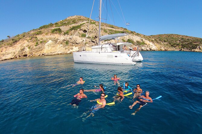 Luxury Catamaran Cruise Including pickup and Traditional Food - A Greek family-style meal by the sea