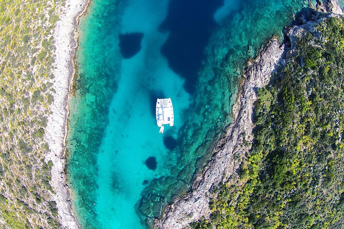 Luxury Catamaran Cruise Including pickup and Traditional Food - Sun, drinks, and the first swim