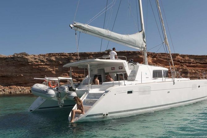 Luxury Catamaran Semi private cruise with meals & drinks and transportation. - Leaving Mykonos by air-conditioned minivan