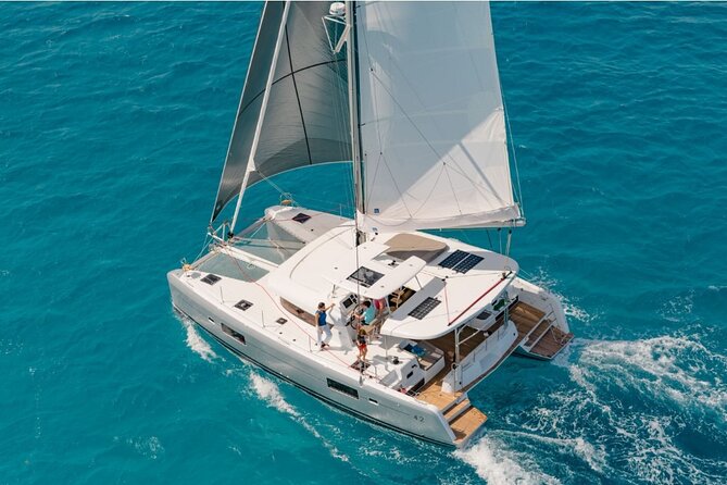 LUXURY Catamaran Sunset and Wine cruise - Central Lisbon lights up after sunset