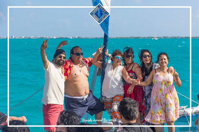 Luxury Catamaran tour to Isla Mujeres with Transportation from Cancun - Group size, language, and the real atmosphere