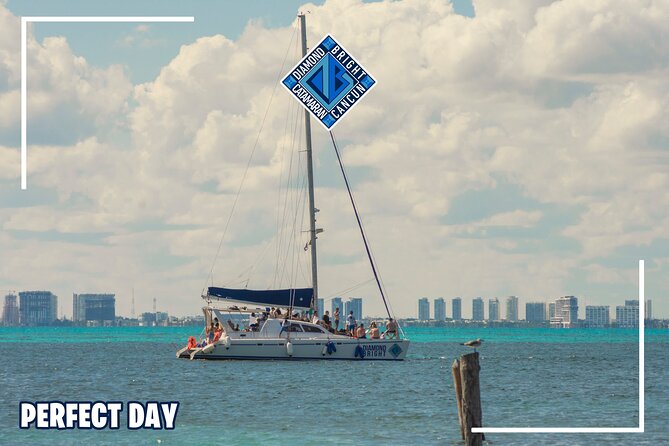 Luxury Catamaran tour to isla mujeres with transportation from Tulum - Swimming, the spinnaker, and the return sail