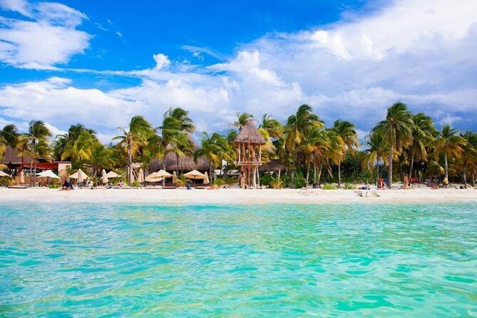 Luxury Catamaran Tour to Isla Mujeres with Transportation - El Meco Reef: warm water and a shared snorkeling stop