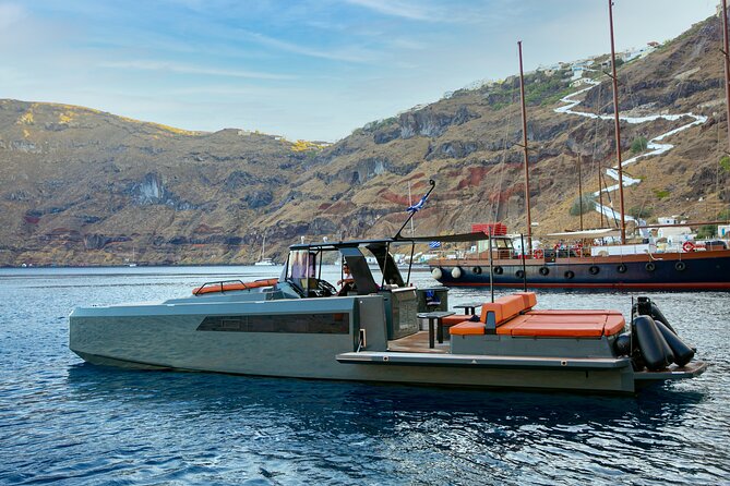 Luxury Private Power Catamaran Tour in Santorini - Thirassia offers a quieter contrast