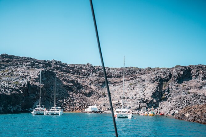 Majestic Catamaran Caldera Cruise with Snacks, Meal & Drinks - White Beach, snorkeling, and the southern caldera