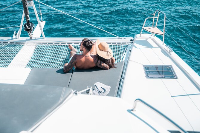 Majestic Catamaran Caldera Cruise with Snacks, Meal & Drinks - A BBQ lunch or dinner with Greek sides