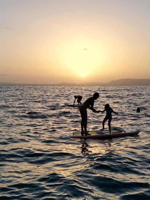 Majorca: Dinner aboard a private catamaran with snorkeling and paddle surfing - The first cove: one hour for swimming and paddle surfing