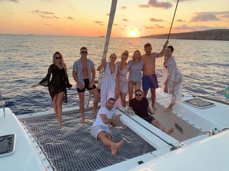 Majorca: Dinner aboard a private catamaran with snorkeling and paddle surfing - A short 15-minute sail to dinner