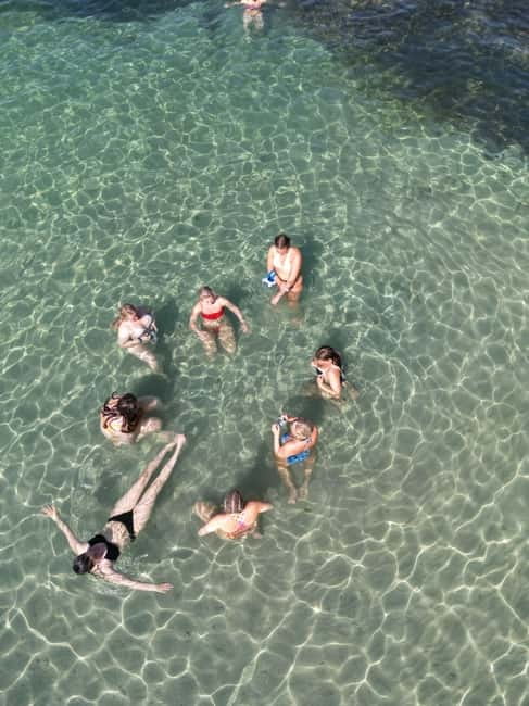 Majorca: Dinner aboard a private catamaran with snorkeling and paddle surfing - Who will enjoy this Palma sailing most