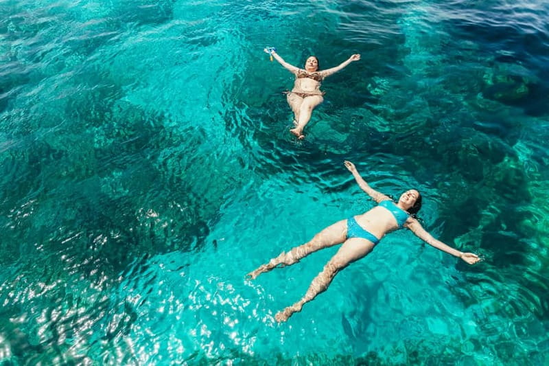 Malta: Blue Lagoon, Beaches & Bays Trip by Catamaran - Anchor Bay and the view of Popeye Village