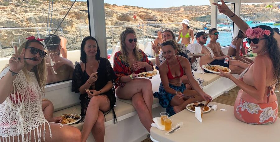 Malta: Blue Lagoon Evening Catamaran Cruise - Anchor Bay and Popeye’s Village