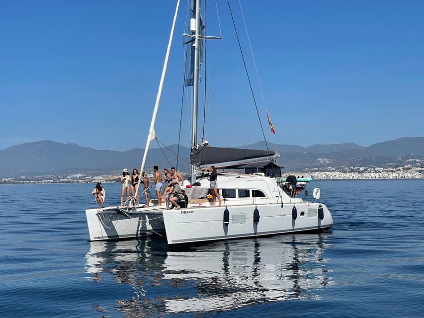 Marbella: Group Dolphin Watching Catamaran Tour with Snacks - Setting out from Puerto José Banús