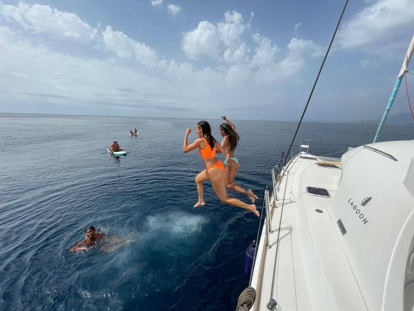 Marbella: Group Dolphin Watching Catamaran Tour with Snacks - Sailing when the wind cooperates