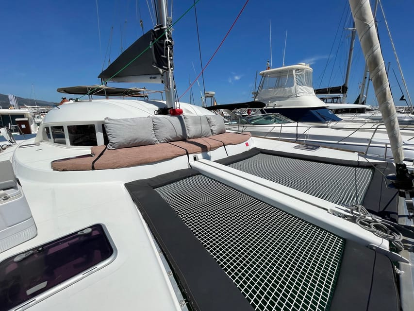 Marbella: Private Cruise in Catamaran - Swimming, paddleboards, kayaks, and fishing